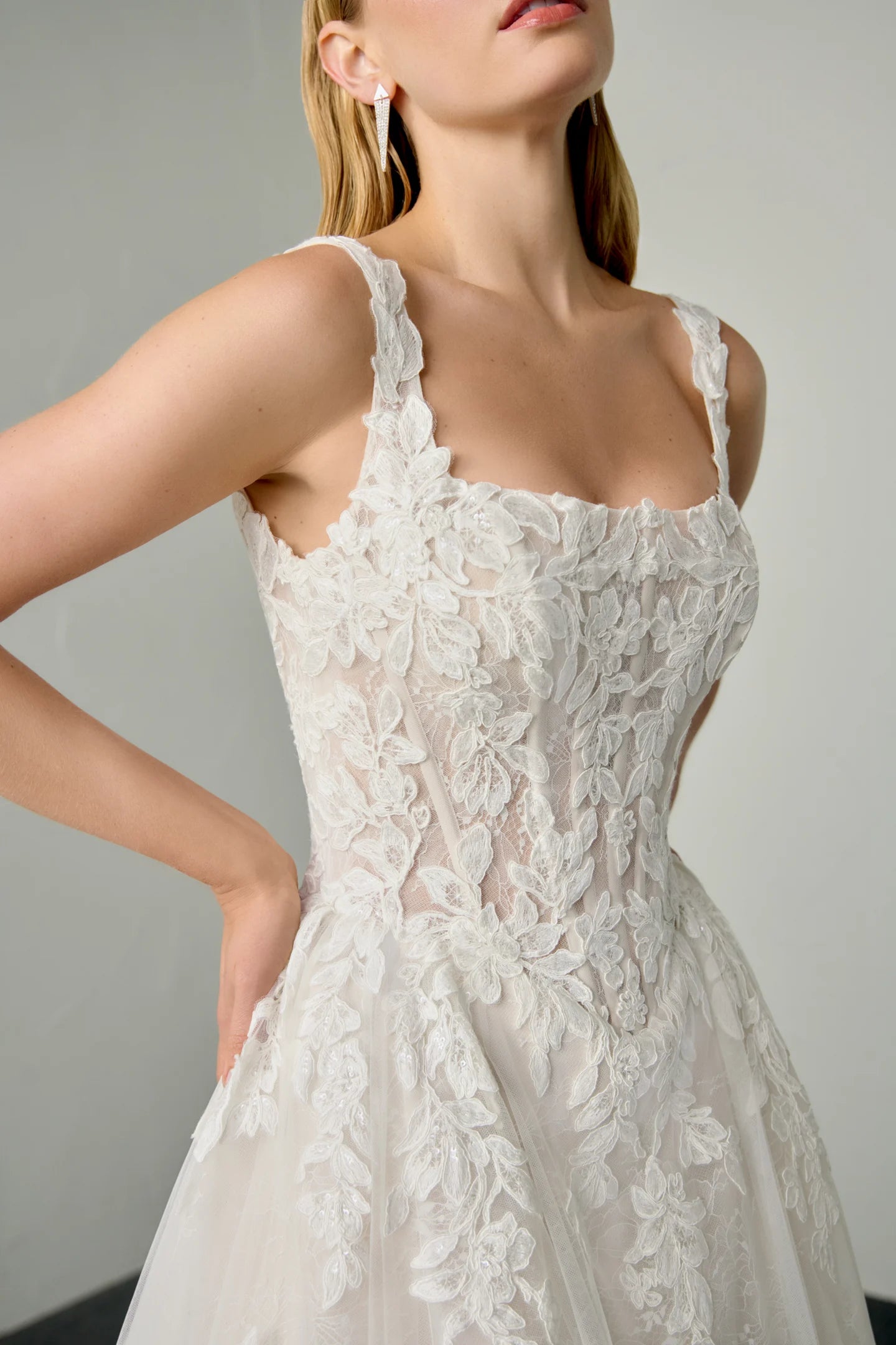 Bride wearing Justin Alexander Noor lace ball gown in Sand Ivory Latte