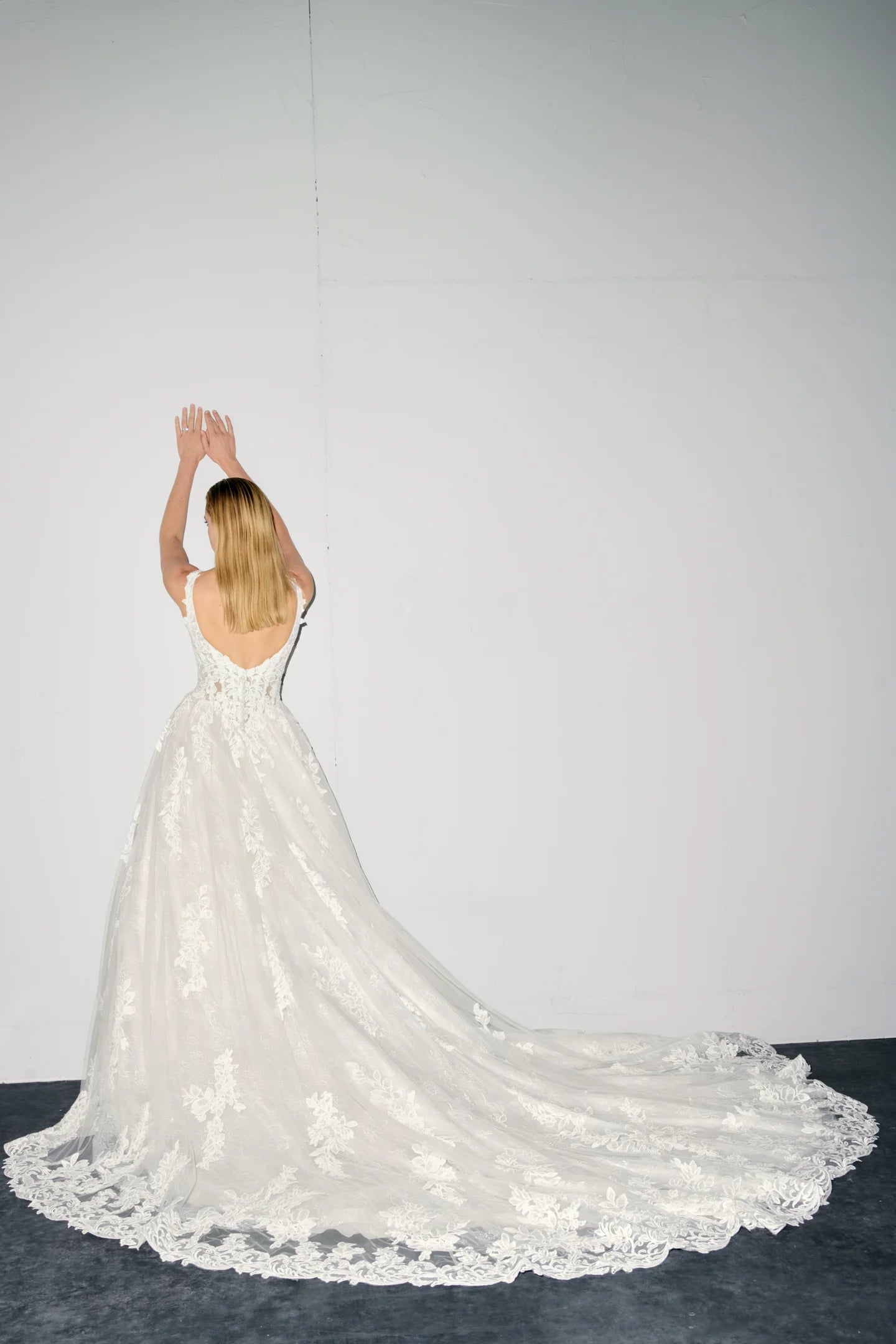 Back of Justin Alexander Signature Noor lace wedding dress with cathedral train